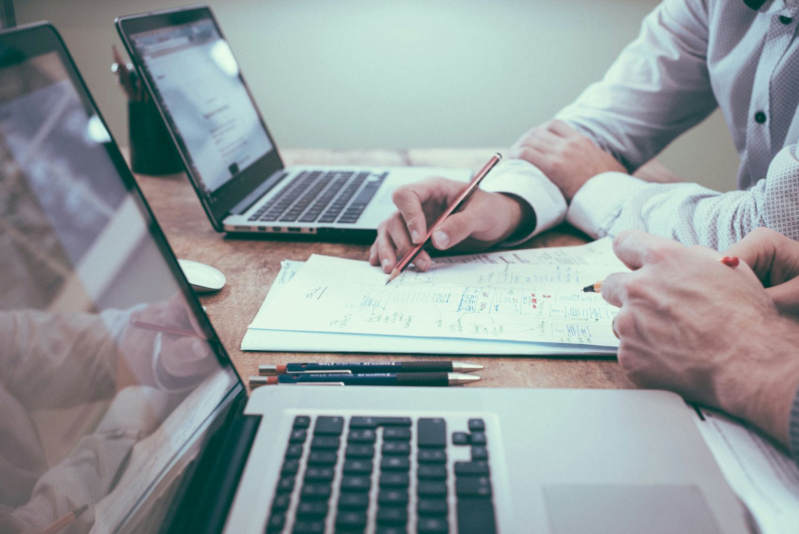 image of people at desk.