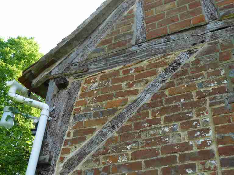 Image of an exposed timber frame.