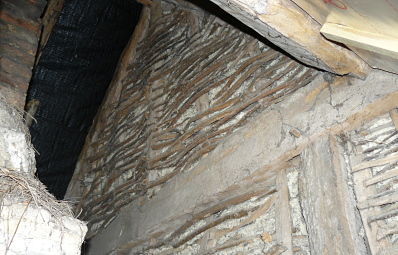 Image of old wattle and daub in a loft.