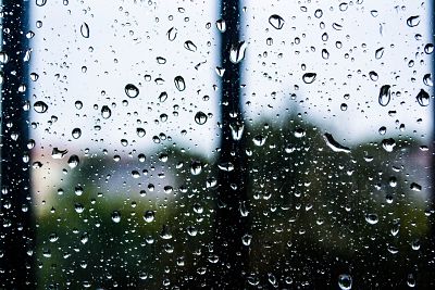 Image of a window obscured by rain.